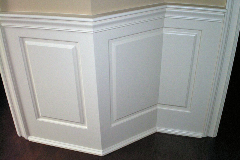 Split Raised Panel Wainscoting mitered through the 45 degree corner.
